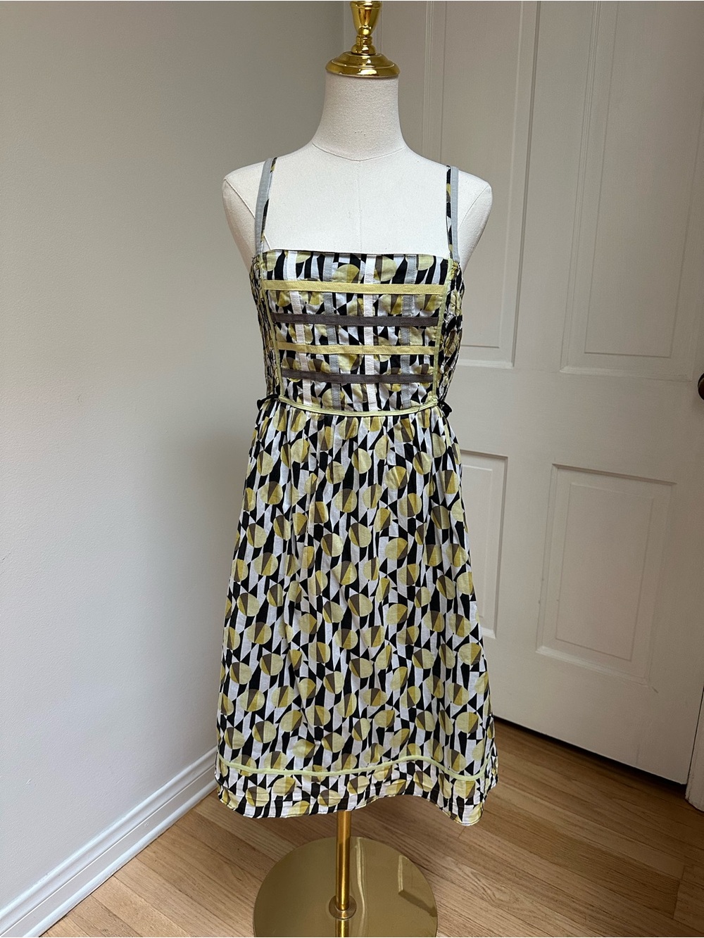 Free People black, white, and gold leaf-shaped print dress